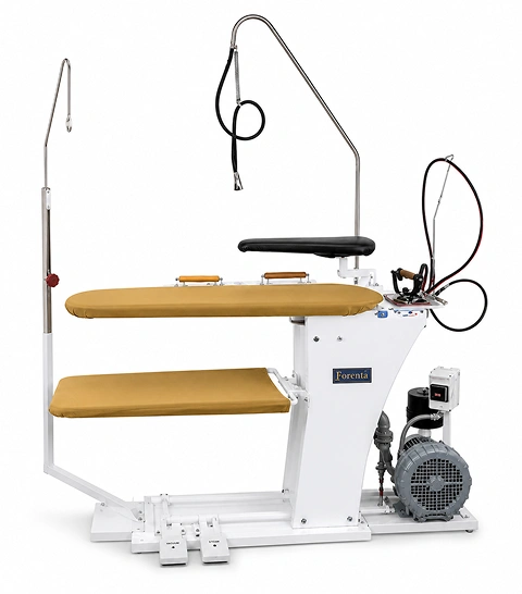 Forenta 46SVB steam-vacuum  finishing board with flat tan padded buck surface,  white pedestal stand, iron set tray, and foot  pedal controls, front view