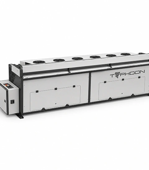 Laco Typhoon flatwork feeder front three-quarter view showing full machine length, Typhoon branding, and feeding belt surface