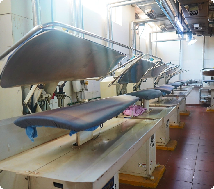 Medanta Hospital Gurugram Row Of Industrial Flat Bed Presses For Hospital Garment And Uniform Finishing