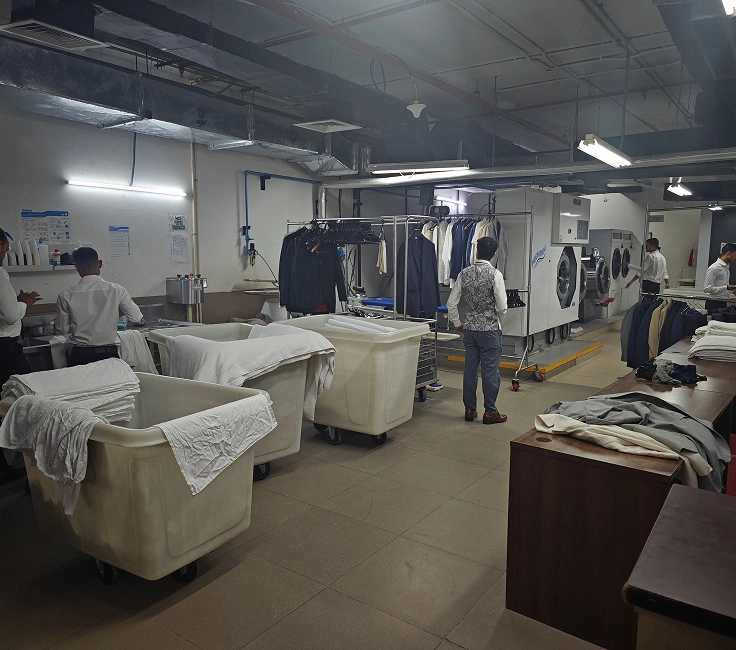 Italclean dry cleaning press in operation at Grand Hyatt Gurgaon laundry facility