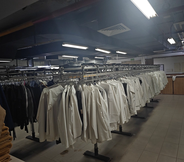 Finished garments on Forenta garment conveyor at Grand Hyatt Gurgaon laundry facility