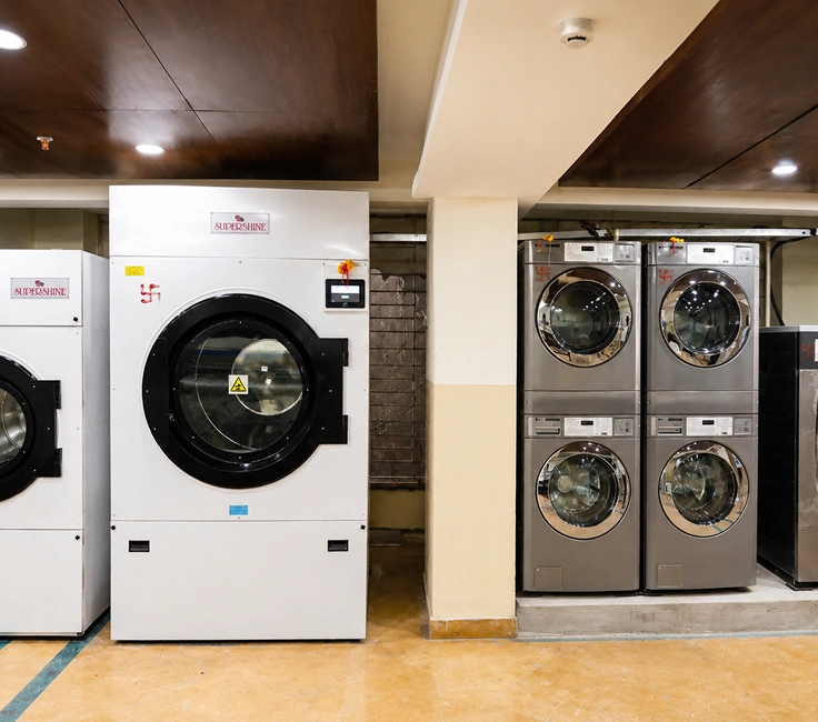 Supershine industrial tumble dryers two capacity sizes installed at Damodar Dham guest house Rajasthan